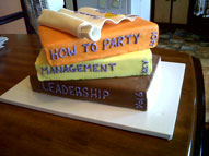side graduation books cake